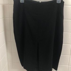 Silk black skirt with fun kick pleat